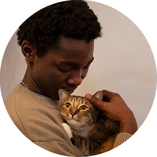 Customer profile image: Marcus Johnson (male) and his cat (ginger tabby adult cat)